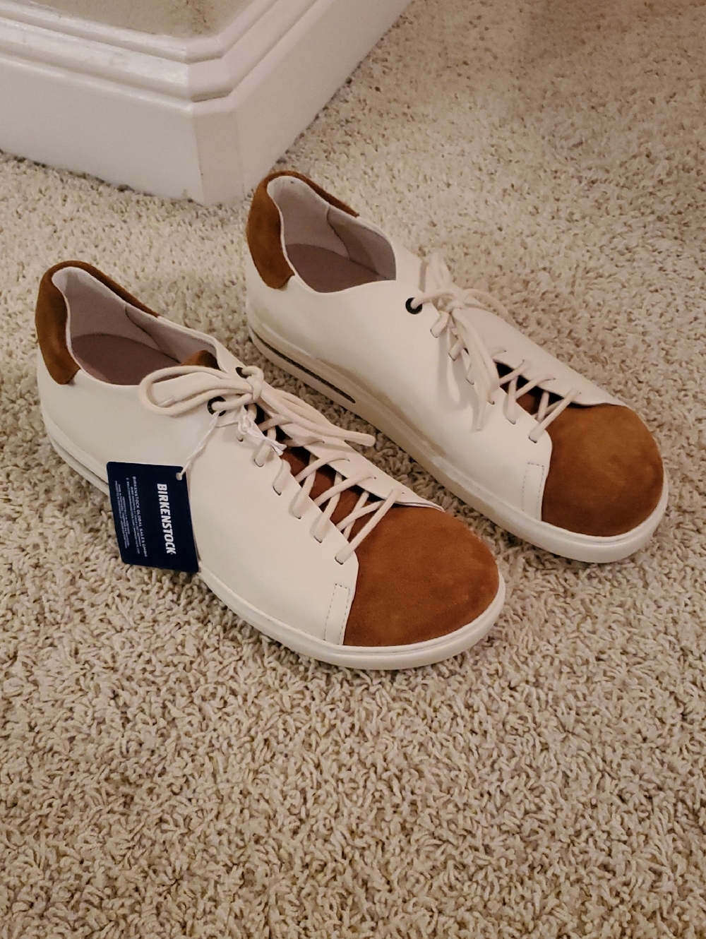 Birkenstock Men’s White/Cream Sneakers with Brown Suede Toe & Heel.